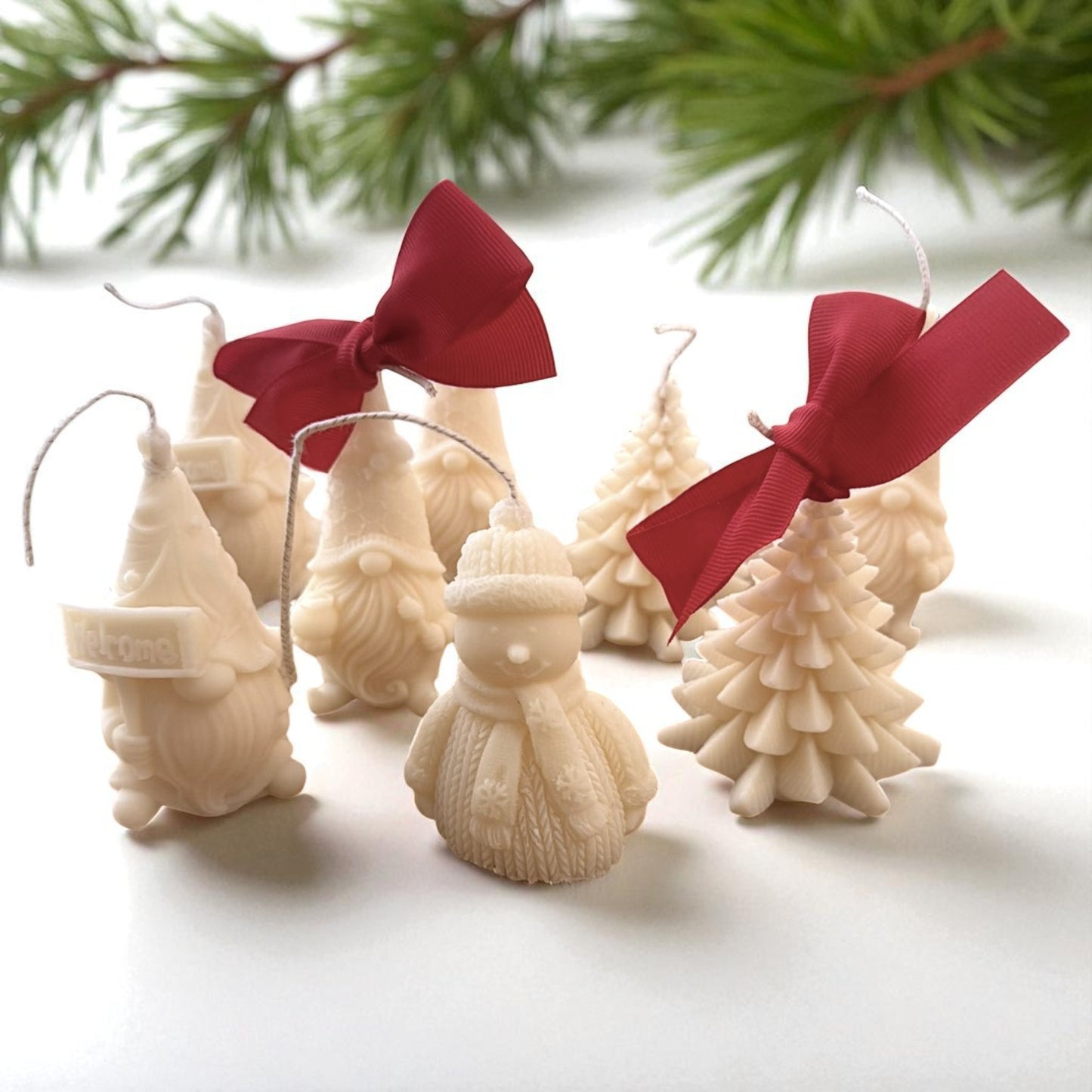 Handmade coconut wax candle in a Christmas tree design.