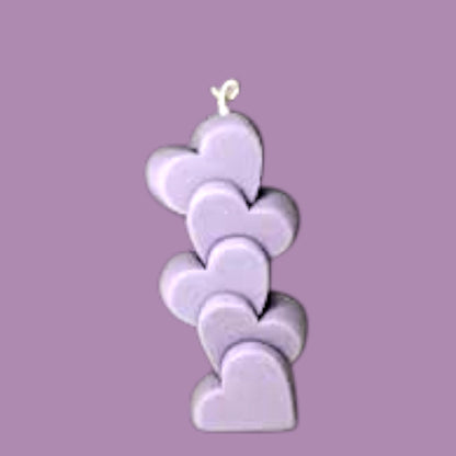 Small candlestick with hearts. Handmade from coconut wax.