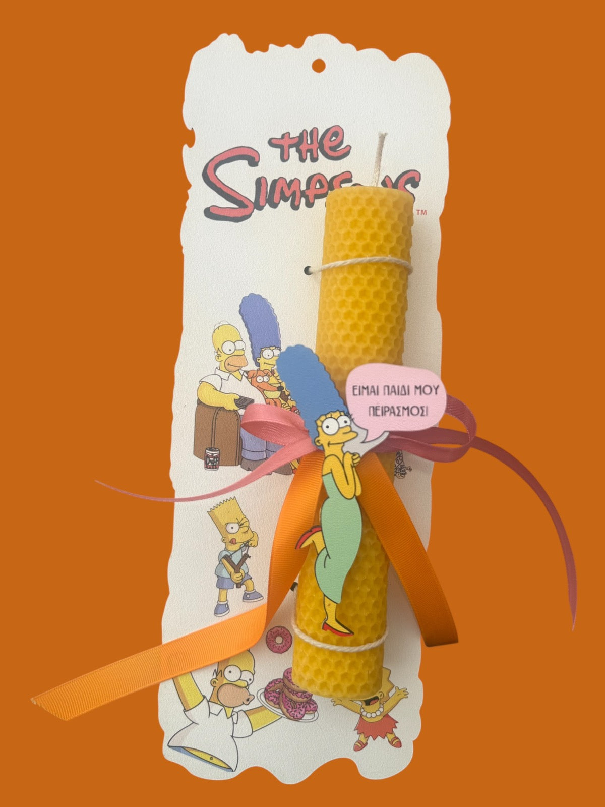 Handmade beeswax candle with Marge Simpson magnet on a decorative wooden plaque.